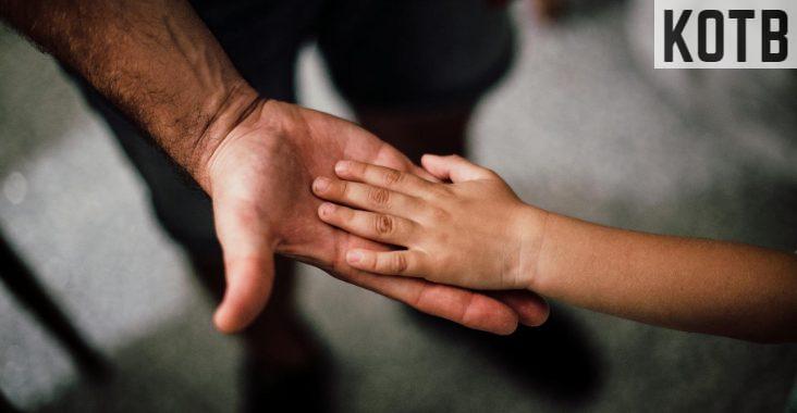 Father and Child's Hands Together