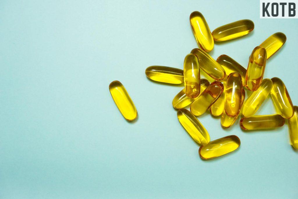 Yellow Capsules on Blue Surface