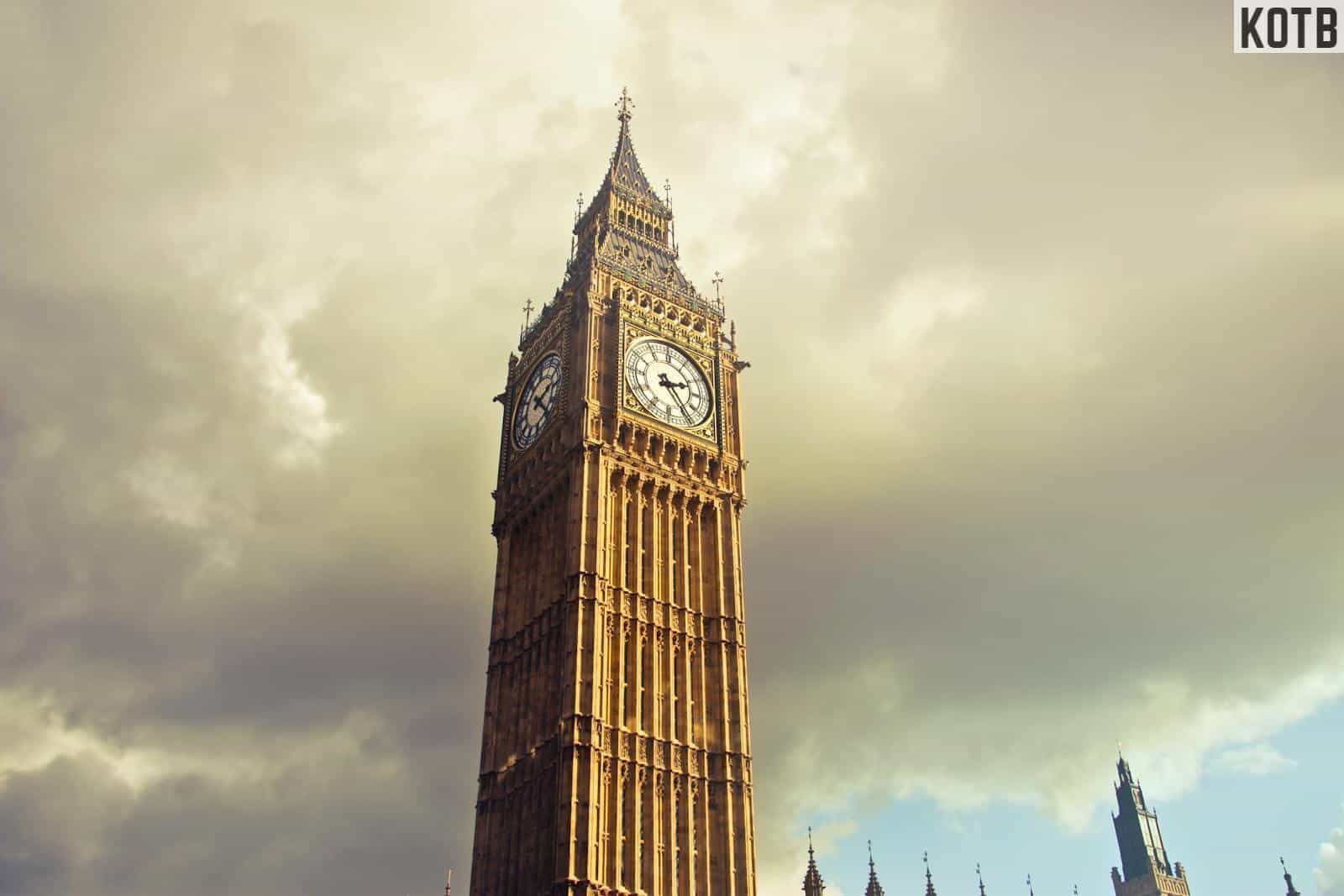 Capture of Big Ben against a cloudy sky in London's cityscape, symbolizing British heritage.