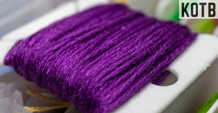 a purple knitted hat
