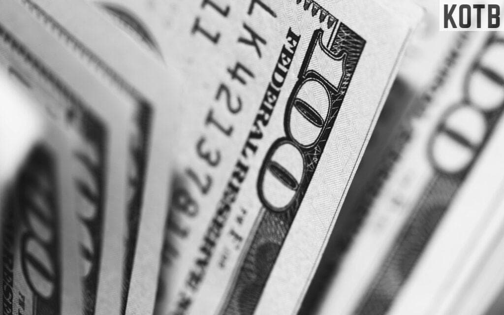 closeup photo of 100 US dollar banknotes